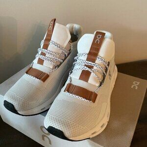 On Running White and Tan Athletic Shoes with Cushioned Midsole